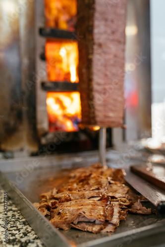 Turkish Doner Kebab, Shawarma or Gyros. Traditional Turkish Doner Kebab meat, shawarma or gyros. Turkish, greek or middle eastern arab style doner kebab food spit.