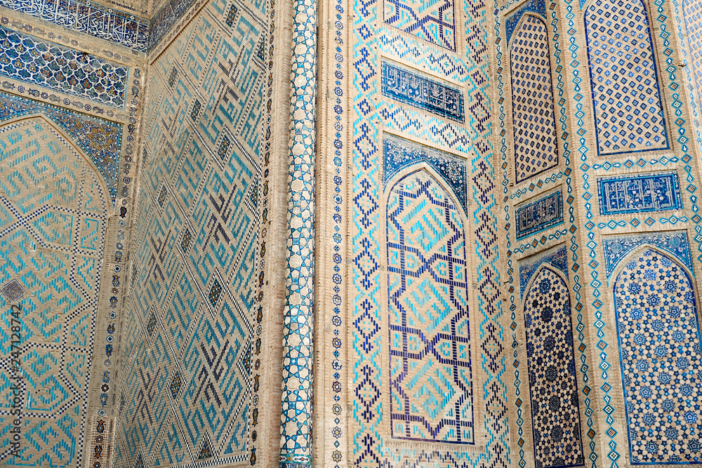 The Shah-i-Zinda Ensemble mausoleums. Symmetrical decorative ornament on wall. Samarkand, Uzbekistan