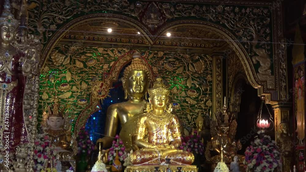 Buddha sculptures in the Buddhist temple Wat Ming Muang. Chiang Rai, Thailand Buddha sculptures in the Buddhist temple Wat Ming Muang. Chiang Rai, Thailand