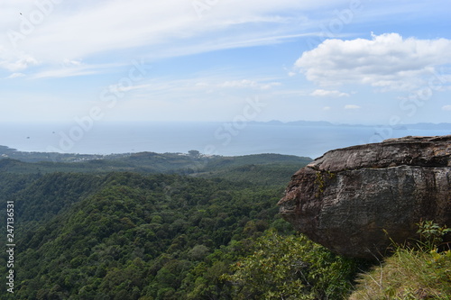 Panorama view with a big rock over Krabi at the jungle hiking trail to dragon crest in Khao Ngon Nak in Krabi, Thailand, Asia