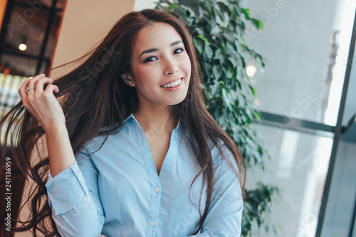 Canvas Print Portrait of beautiful charming romantic brunette long hair smiling asian girl ne