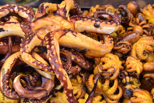 Fresh grilled squid on the chatuchak local market in Bangkok, Thailand