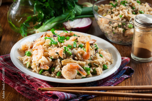 Fried rice with shrimp and vegetables served on a plate