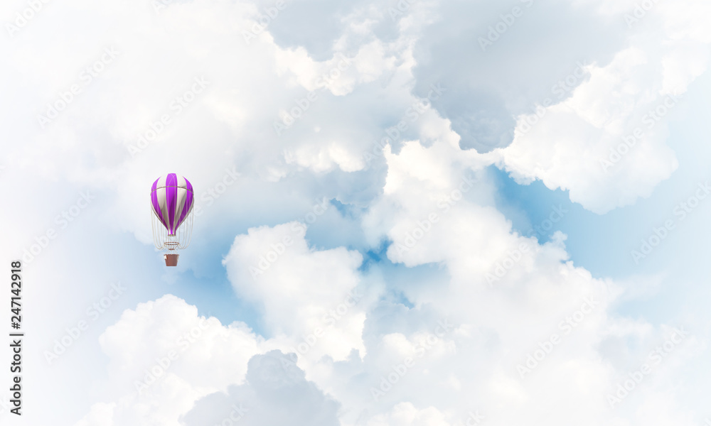 Obraz premium Flying hot air balloon in the air.