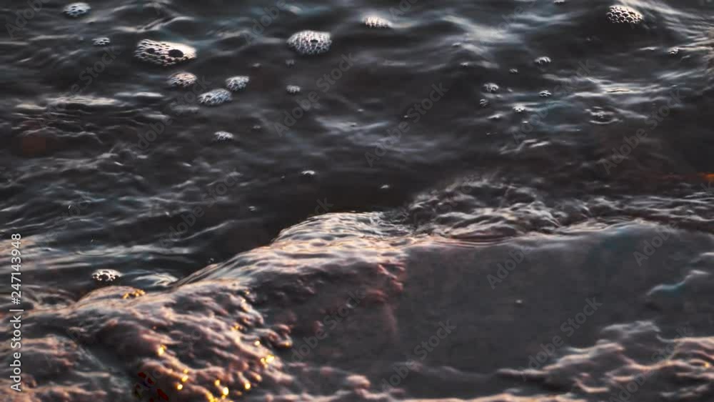 Panning over ice on a cliff at the sea Panning over ice on a cliff at the sea