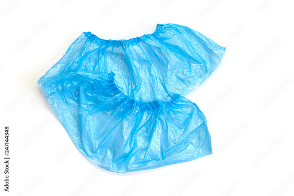 Hygiene and cleanliness in medical institutions. Blue medical shoe covers.