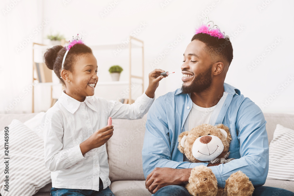 Funny time. Daughter doing makeup to her dad Funny time. Daughter doing makeup to her dad
