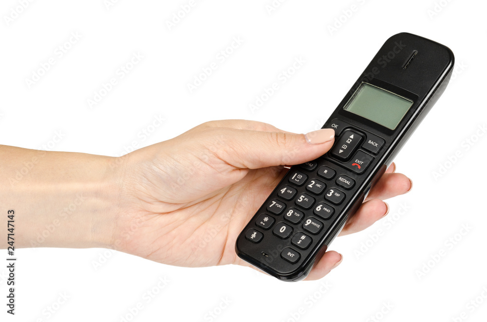 modern landline cordless phone with hand, old technology concept. modern landline cordless phone with hand, old technology concept.