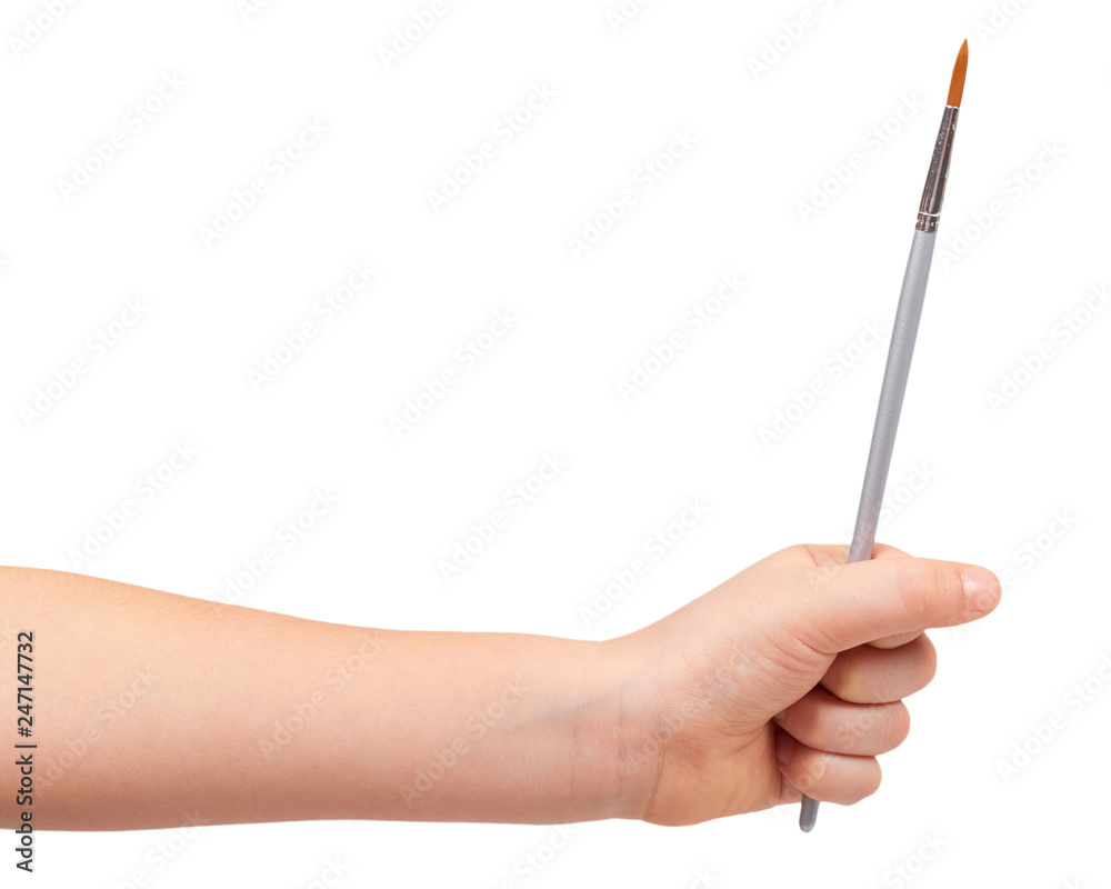 Kids hand with gray painbrush, painter concept Kids hand with gray painbrush, painter concept