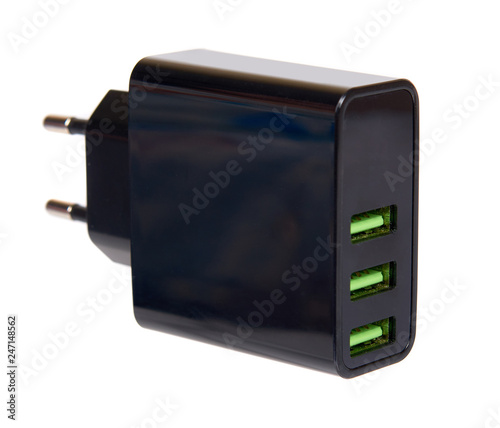 Black USB wall chrger plug, three ports.
