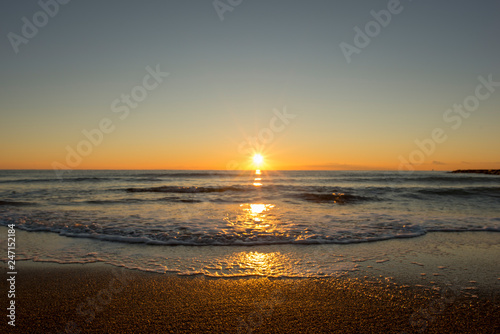 Sunrise on a beach in Denia  Alicante