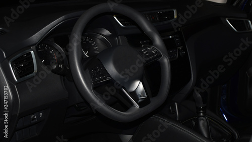 Stylish dark image of modern car interior. © JRJfin