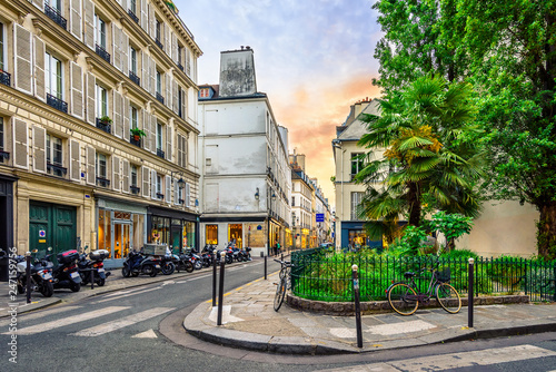 Cozy street in Paris, France. Architecture and landmark of Paris. Evening Paris cityscape.