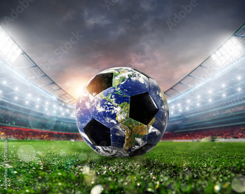 Fototapeta Naklejka Na Ścianę i Meble -  Soccer ball a as world. Earth provided by NASA.