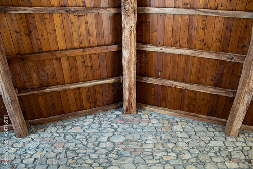 Wooden hand made roof in old  stone built country house in Italy.