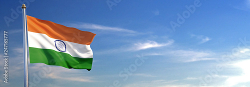 Flag of India rise waving to the wind with sky in the background photo