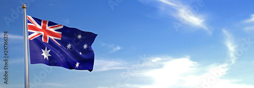 Flag of Australia rise waving to the wind with sky in the background