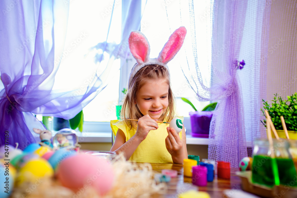 colorful painted eggs, flowers in vase. Happy easter girl in bunny ears having fun and painting eggs. small child at home. spring holiday colorful painted eggs, flowers in vase. Happy easter girl in bunny ears having fun and painting eggs. small child at home. spring holiday