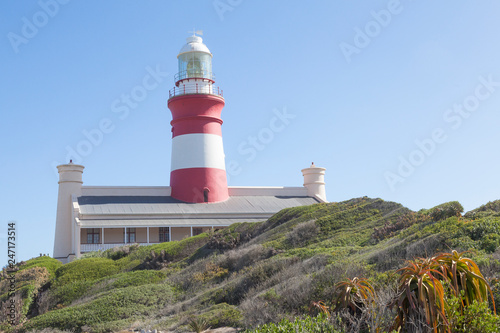 The historic Cape Agulhas Lighthouse at the southernmost tip of Africa where the Indian and Pacific Oceans meet, Western Cape, South Africa