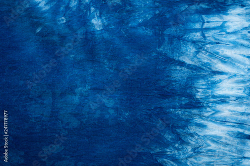 Seamless dye fabric background, Pattern of dark blue indigo abstract