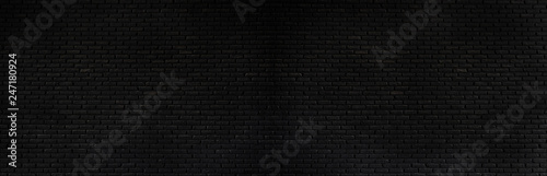 panorama  black brick wall texture, brick surface background. Vintage floor wallpaper.