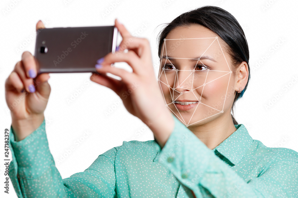 Facial Recognition System of smart phone isolated on white background. Biometrics concept