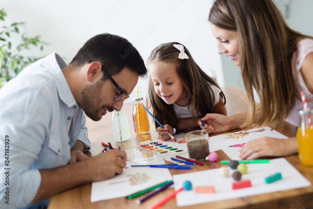 Happy family having fun time at home Happy family having fun time at home