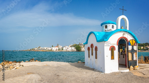 Colorful greek orthodox chapel by the sea near Chania in Crete, Greece