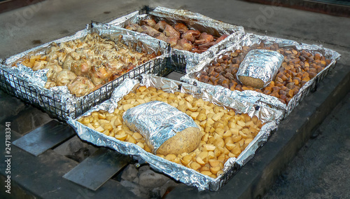 Traditionally cooked hangi meal, food cooked under the ground in an earth oven by Maori people, Rotorua, North Island, New Zealand