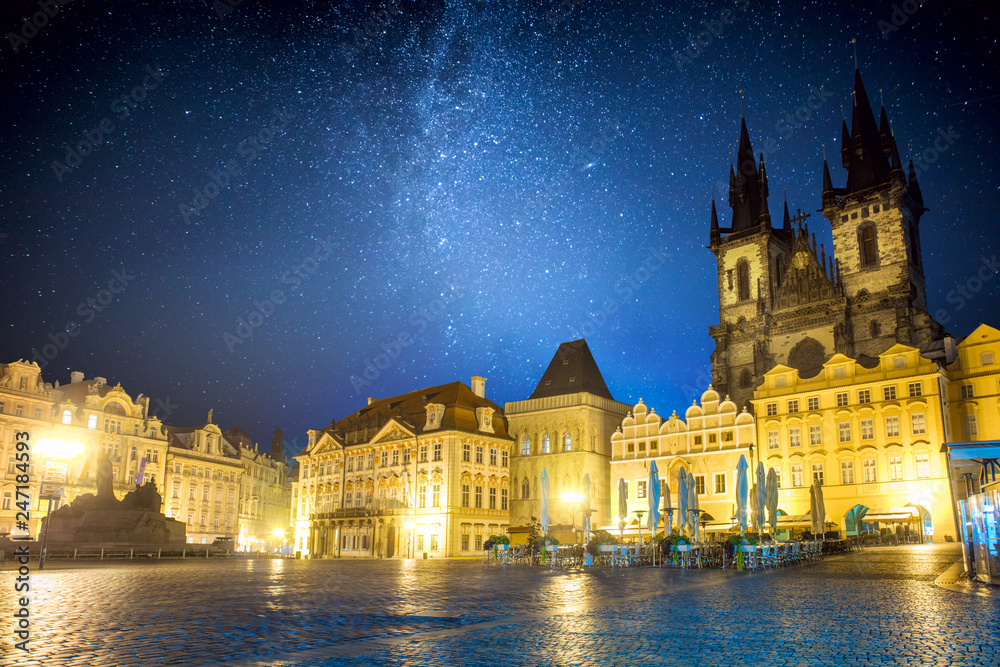 Famous Old Town Square at night in Prague with stars sky