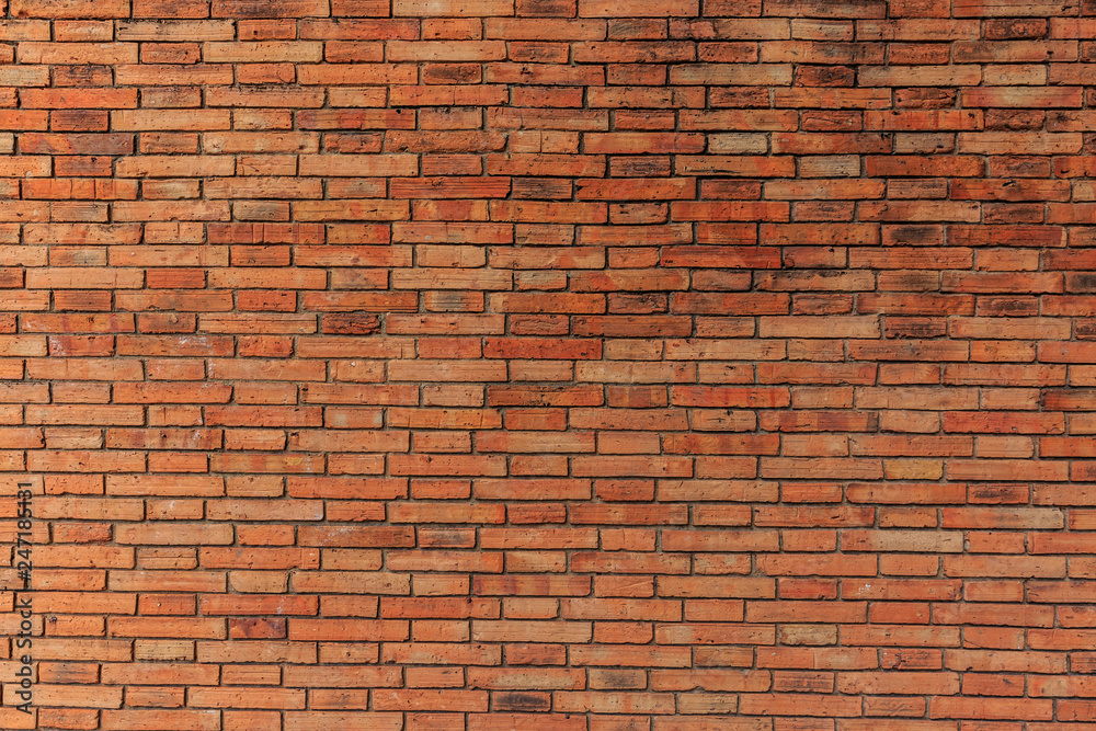 The background of textured brick wall. The walls of the house The background of textured brick wall. The walls of the house