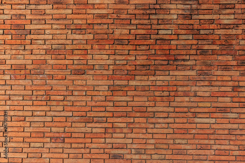 The background of textured brick wall. The walls of the house