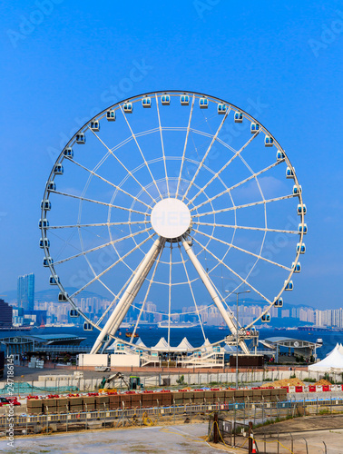 HONG KONG, CHINA -   SEP 12, 2015 : The Hong Kong Observation Wheel,The area around the wheel includes a plaza for events as well as drinks and snacks and free Wi-Fi. © kowitstockphoto