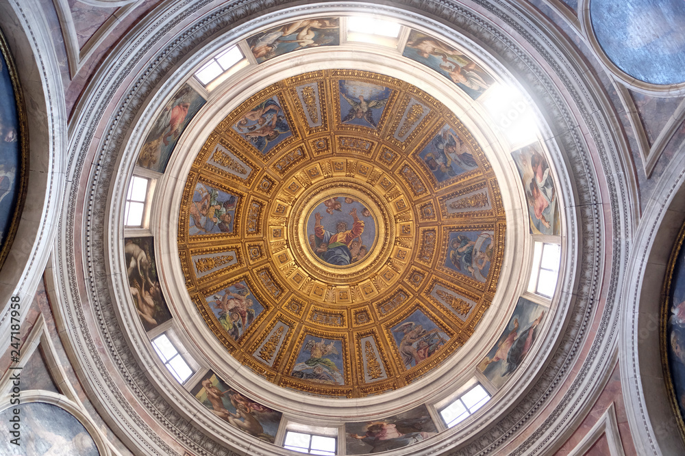 The cupola in Chigi chapel designed by Raphael, painting of the creation story by Francesco Salviati in Church of Santa Maria del Popolo, Rome, Italy 