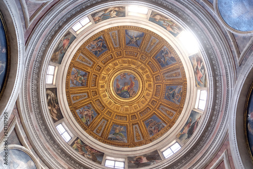 The cupola in Chigi chapel designed by Raphael, painting of the creation story by Francesco Salviati in Church of Santa Maria del Popolo, Rome, Italy  photo