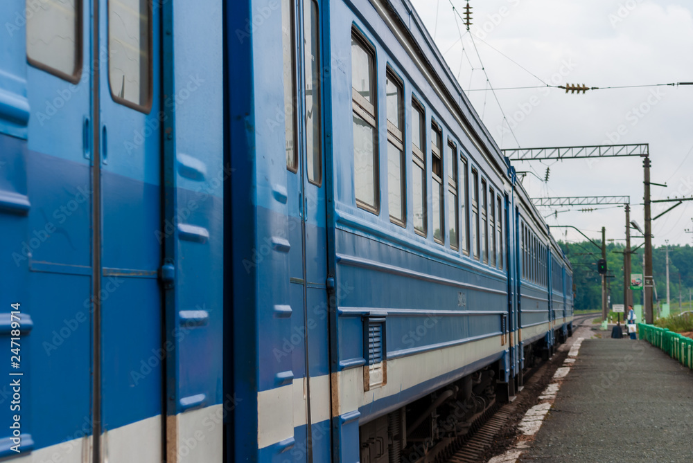 Suburban train arrived at some low platform at Ryazan oblast