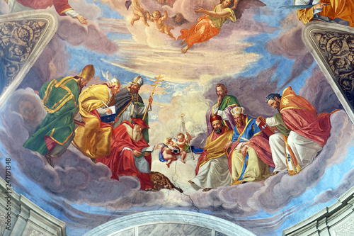 The evangelists and prophets detail of frescoes Apotheosis of St James by Silverio Capparoni on the ceiling of the Church San Giacomo in Augusta in Rome, Italy