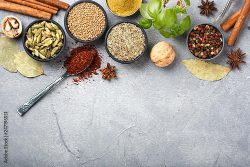 Fototapeta Naklejka Na Ścianę i Meble -  Wooden table of colorful spices.