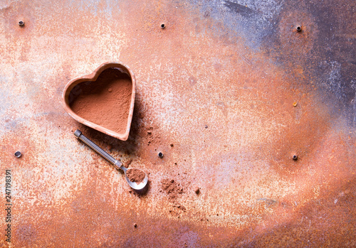 Heart on a rusty metal background.