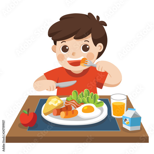 A little boy happy to eat breakfast in the morning.