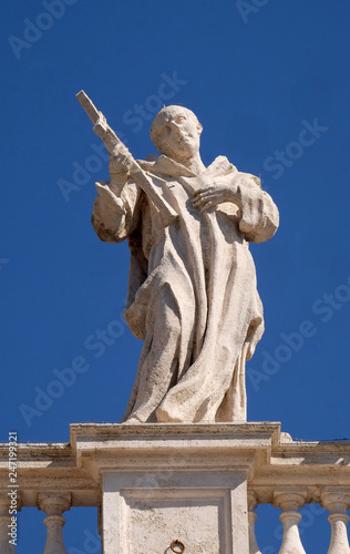 St. Bruno, fragment of colonnade of St. Peters Basilica. Papal Basilica of St. Peter in Vatican, Rome, Italy
