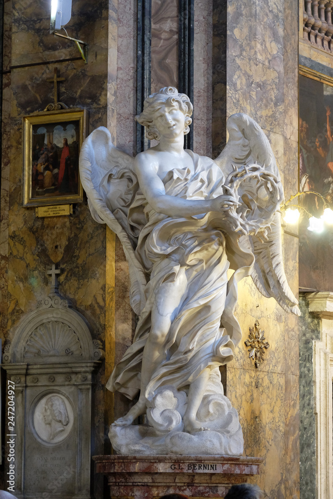 Statue of the Angel with the scroll by Bernini in Basilica di Sant Andrea delle Fratte, Rome, Italy