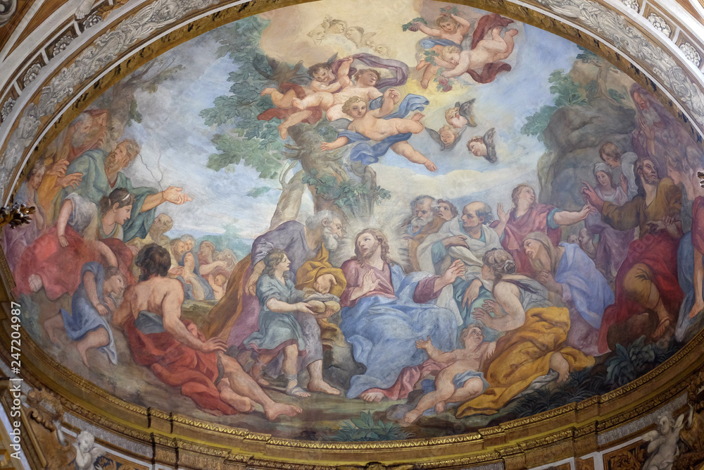 The fresco of The Miracle of Multiplication on the main apse of Basilica di Sant Andrea delle Fratte, Rome, Italy 