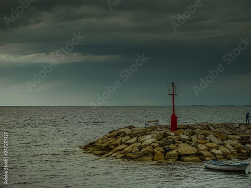 lighthouse in sea  photo