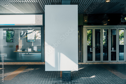 Fototapeta Naklejka Na Ścianę i Meble -  Train station with empty white poster