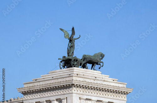 Statue of the goddess Victoria riding on quadriga, National Monument of Victor Emmanuel II, Rome, Italy   photo