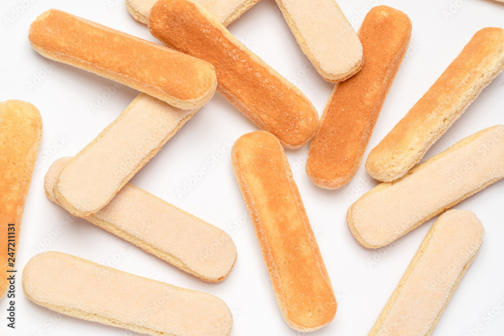Traditional Italian Savoiardi ladyfingers Biscuits on White Background Traditional Italian Savoiardi ladyfingers Biscuits on White Background