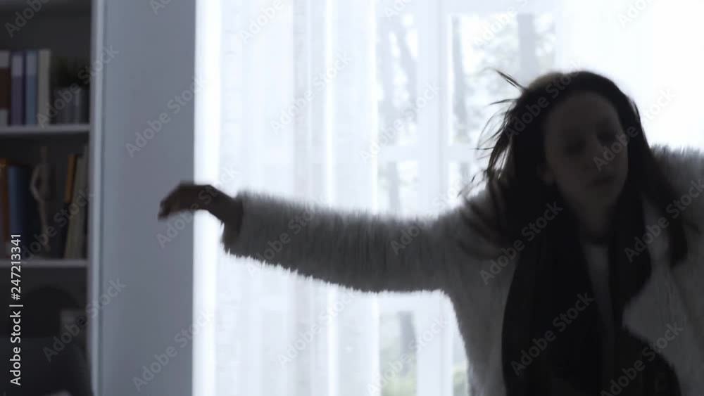 Exhausted woman getting back home and lying on bed Exhausted woman getting back home and lying on bed