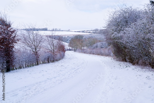 Yorkshire Wolds Road in Winter. Snow covered and blocked country road high on the Yorkshire Wolds.