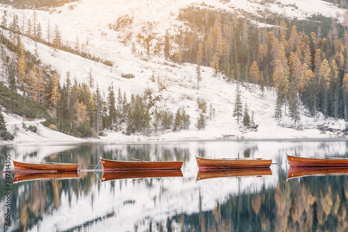 Obraz na plátně Boats waiting for tourist rent in Braies lake in Dolomites Alps
